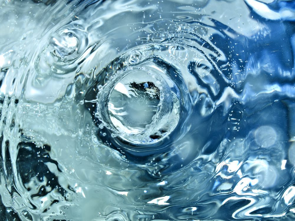 A close up of water with bubbles in it